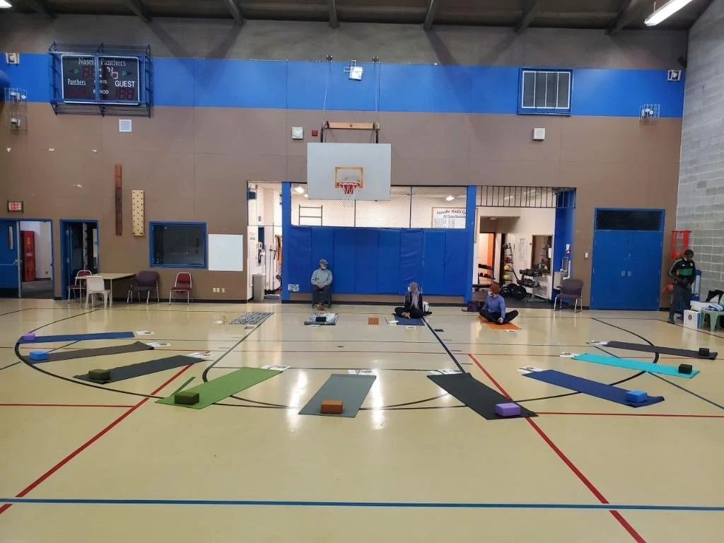 Group of yoga practitioners and teachers